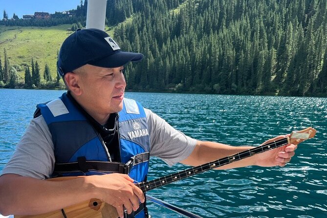 2 Days Private Tour in Kolsai, Kaindy lakes, and Charyn Canyon - Kaindy Lake birch grove: turquoise water with firs left standing