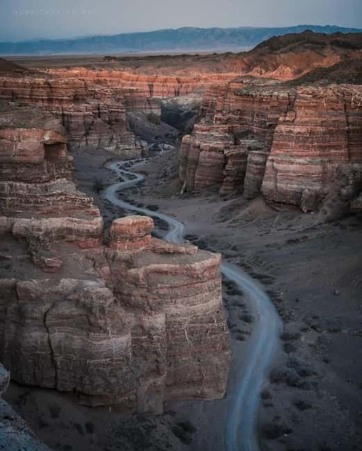 Almaty: Explore 3 Scenic Canyons and Kolsay Lake in 1 Day - Compass pickup and the long coach ride that sets the tone