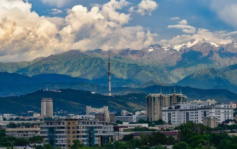 Almaty: Horseback Riding & Archery in Zaili Alatau Mountains - Traditional Archery Outdoors: focus, aim, and Kazakh mountain culture