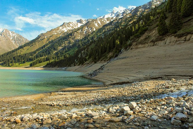 Medeu and Shymbulak + Big Almaty Lake and Falcon show (Private day-tour) - Getting out of Almaty: private pickup, A/C comfort, and tickets handled