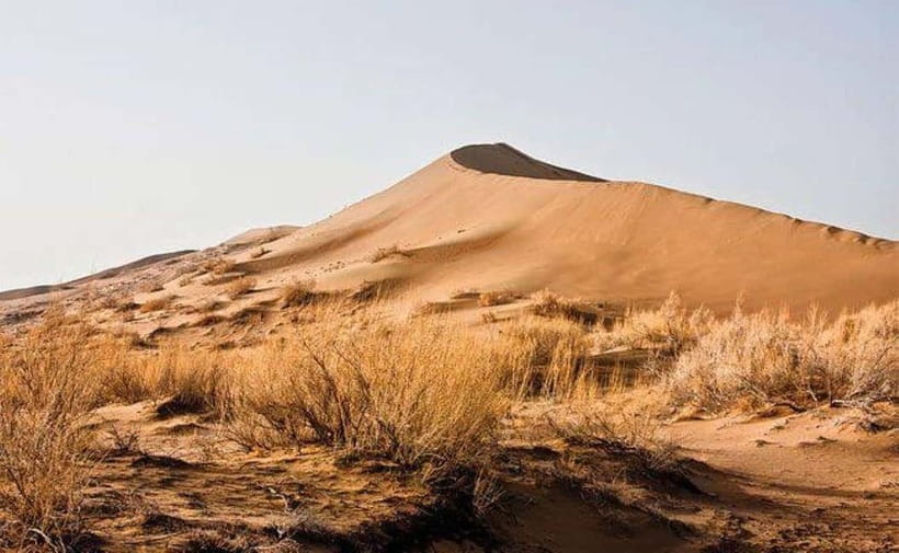 One Day Tour to Altyn-Emel: Singing Dune and Aktau Mountain - Ak-Tau mountains trek: white slopes, odd forms, and steady climbing